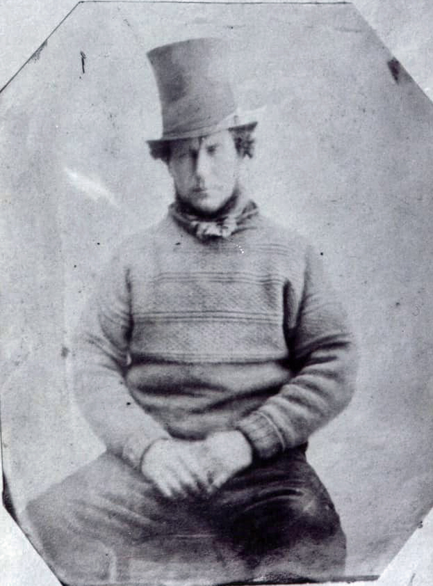Fisherman in a top hat and gansey