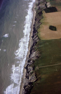 Aerial photograph of rapidly eroding cliffs in the Trimingham section